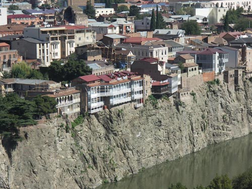 Tbilisi river cliff houses